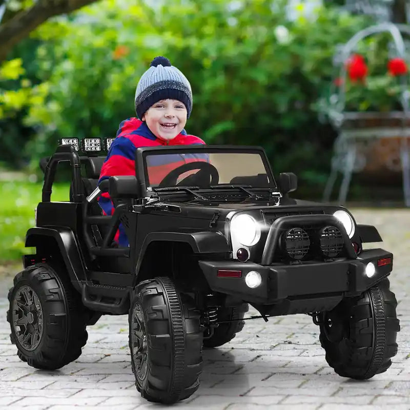 Camion pour enfants 12 V avec télécommande, musique MP3 et feux LED, noir